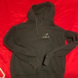 Black hoodie worn